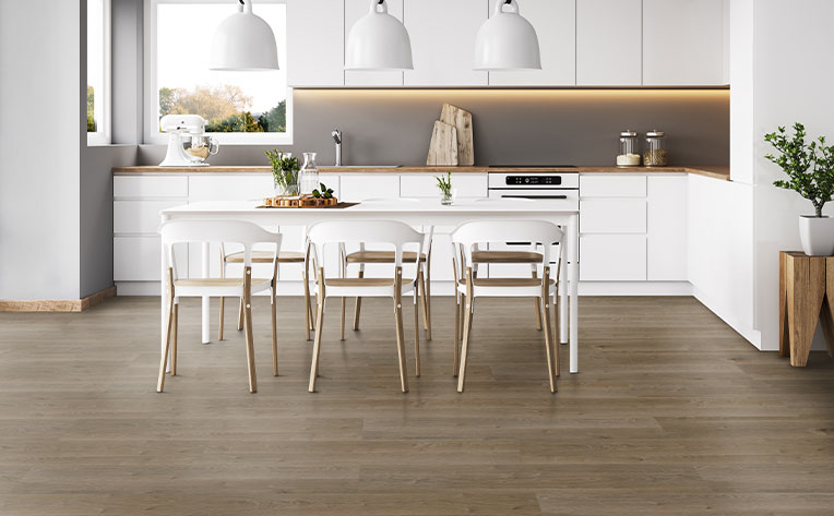 wood flooring in open concept kitchen and living room