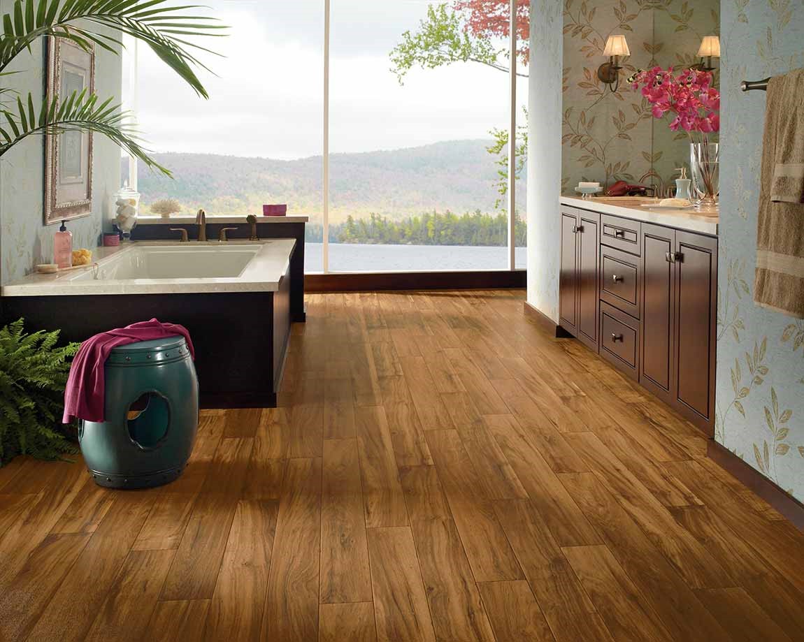 tropical themed bathroom with hardwood look tile and large bathtub tropical themed bathroom with hardwood look tile and large bathtub